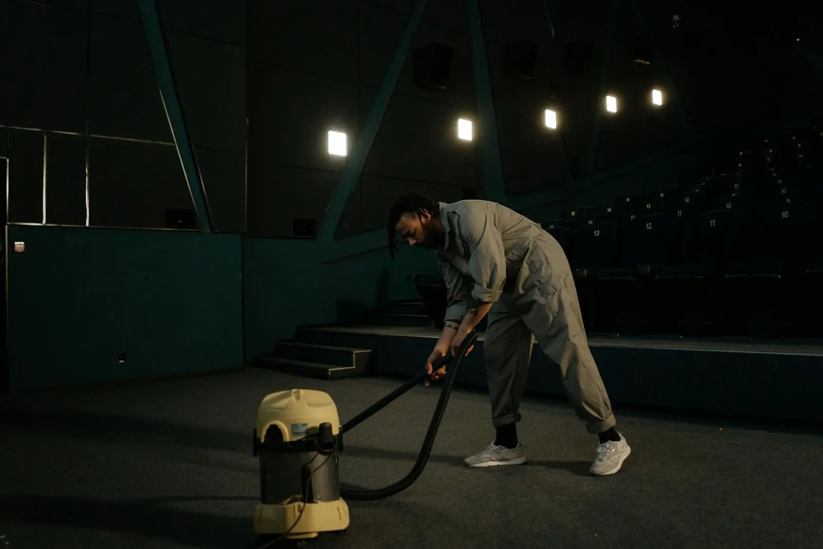 Coastal Facility Services technician servicing a commercial venue after hours